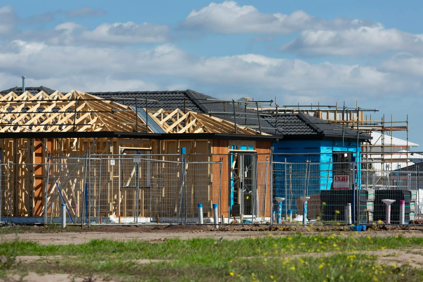 New homes under construction in a growing neighborhood
