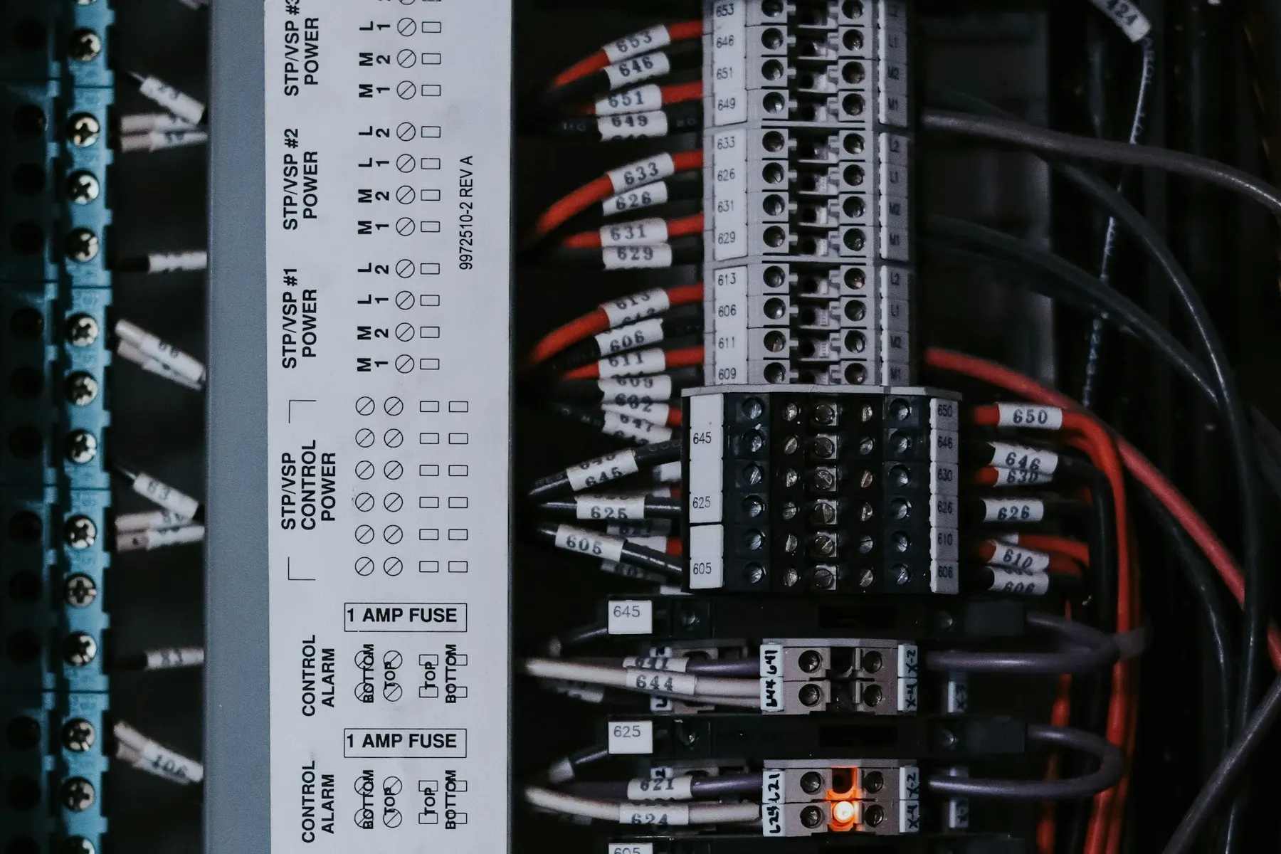 Close-up of circuit breakers and wiring inside an electrical panel